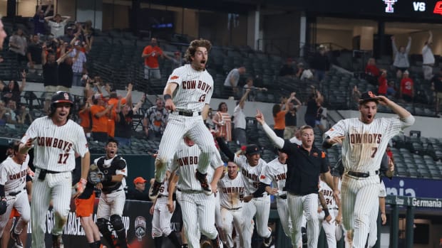 Oklahoma State celebrates after advancing to the 2023 Phillips 66 Big 12 Baseball Championship game.